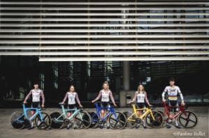 5 athletes with their bikes