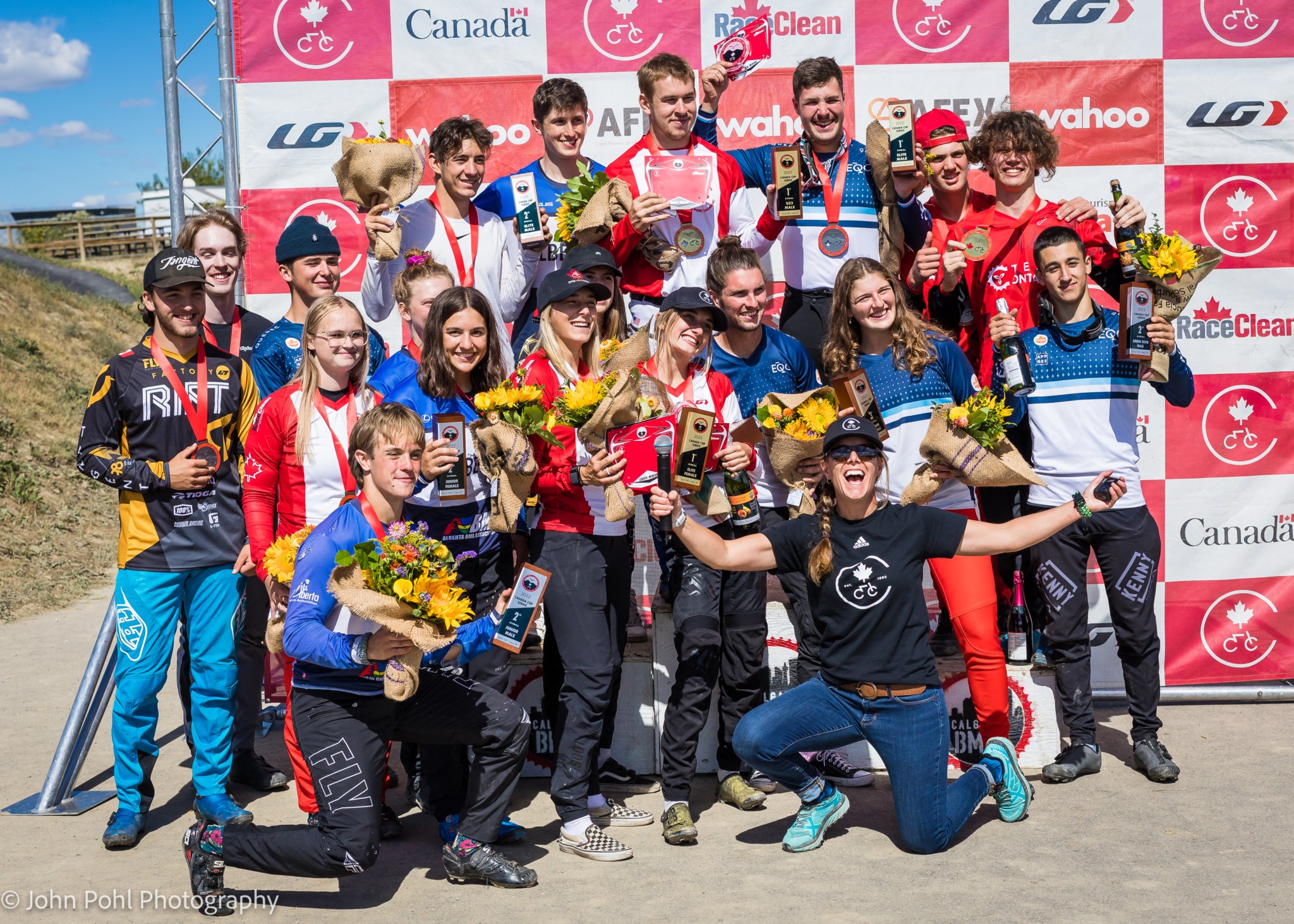Group of athletes with trophies